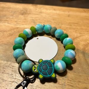 Very cute hand made beaded key chains the disc can be customized